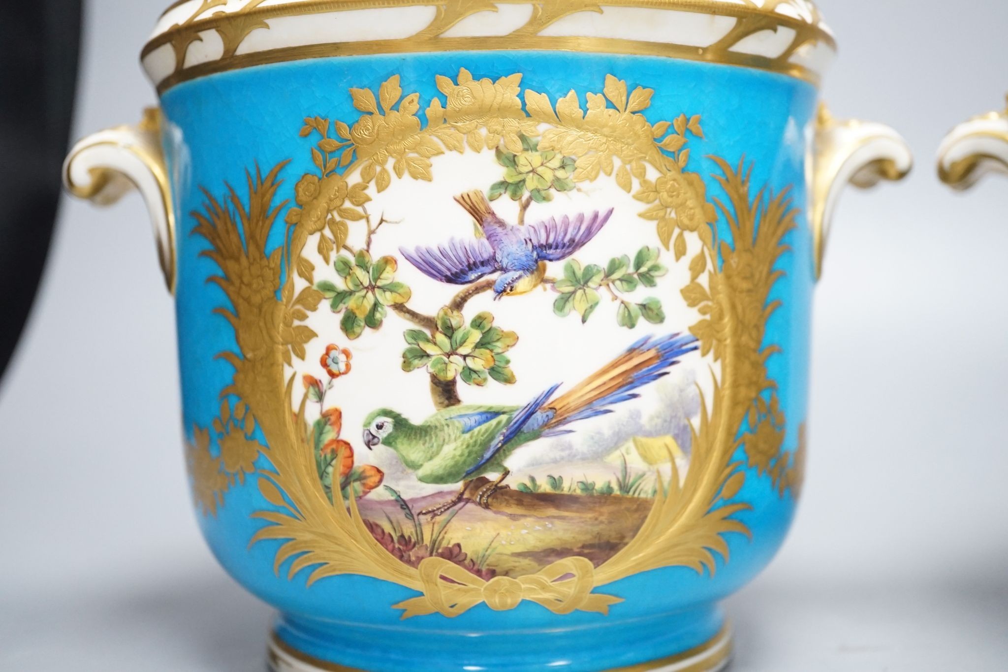 A pair of mid 19th century English porcelain cache pots, 14.5 cms high.
